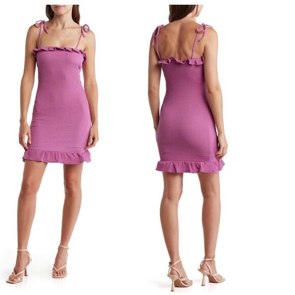 bebe Dresses & Skirts - Bebe smocked mini dress in lilac color size M NWT